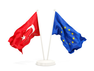 Two waving flags of Turkey and EU isolated on white