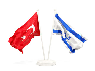 Two waving flags of Turkey and israel isolated on white