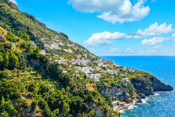 Fototapeta na wymiar A view of a hilltop town Praiano from a scenic drive along the Amalfi Coast on the Italian Mediterranean