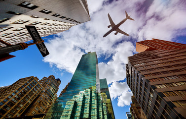 Plane flies low over the New York City Manhattan Skyline USA