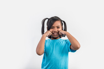 Portrait of Funny little girl acting in studio shot