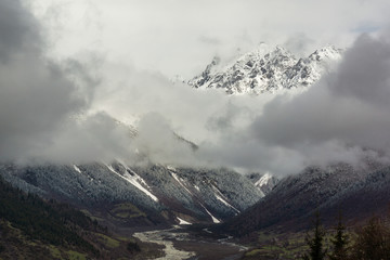 clouds in front of mountain in caucasus