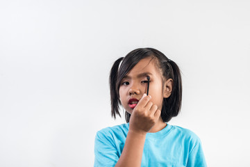 Fototapeta premium Portrait little girl makeup with her face