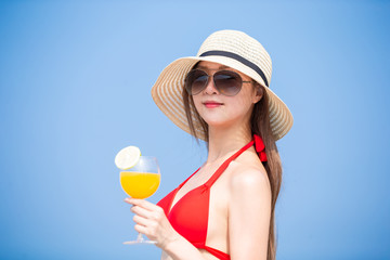 woman enjoy sunshine with juice