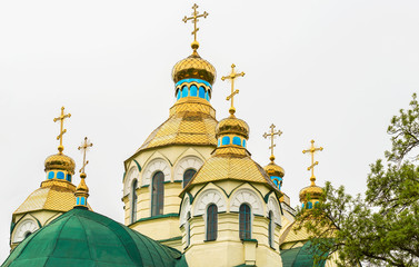 Fototapeta na wymiar View of the domes of the Holy Resurrection Church in the center of Rivne on the site of the wooden church of the Resurrection of Chris