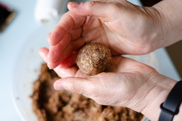 raw food candy made by hand lies on two palms