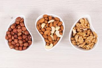 Various nuts and almonds containing healthy natural vitamins and minerals, nutritious eating
