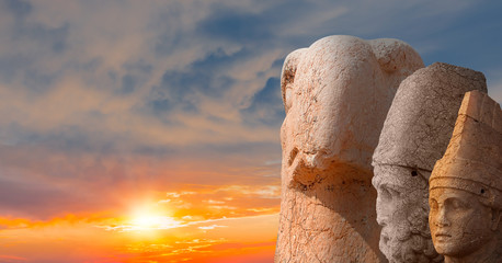 Statues on top of the Nemrut Mountain at sunset - Adiyaman, Turkey 