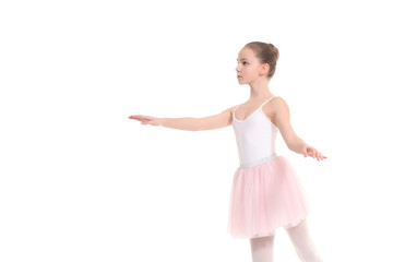 young girl ballerina posing on white background