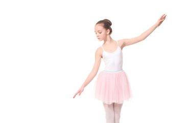 Fototapeta na wymiar young girl ballerina posing on white background