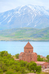 Fototapeta premium Akdamar Island in Van Lake. The Armenian Cathedral Church of the Holy Cross - Akdamar, Turkey