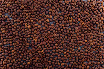 Flavored Coffee Beans Background. Invigorating coffee energy.