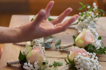 Preparing Groom's Buttonhole flowers