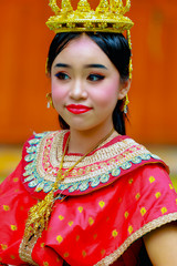 Thai teenage girls in traditional Thai dance costumes