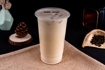 Fresh pressed frozen tea beverage in black background