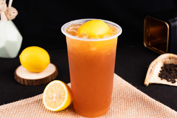 Fresh pressed frozen tea beverage in black background