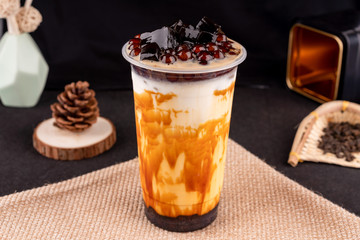 Fresh pressed frozen tea beverage in black background