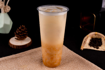 Fresh pressed frozen tea beverage in black background