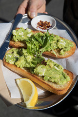 Avocado and Salad on Baguette with Lemon and Chilli Pepper