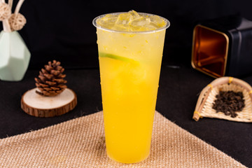 Fresh pressed frozen tea beverage in black background