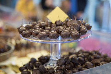 Cherries covered with Dark Chocolate on a Tray