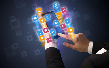 Female hand using smartphone with colorful angular fast switching application icons around