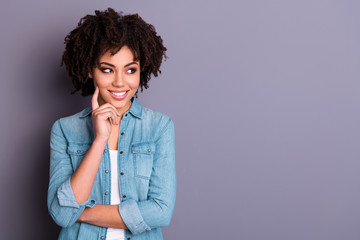 Portrait of positive cheerful cute smart intelligent millennial have different ideas touch finger cheeks face candid satisfied isolated dressed denim modern grey background