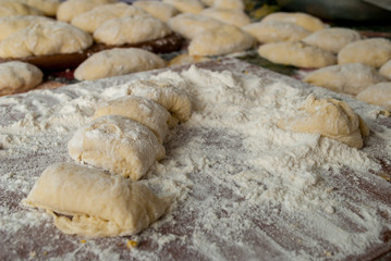 Cooking pies, flour and dough