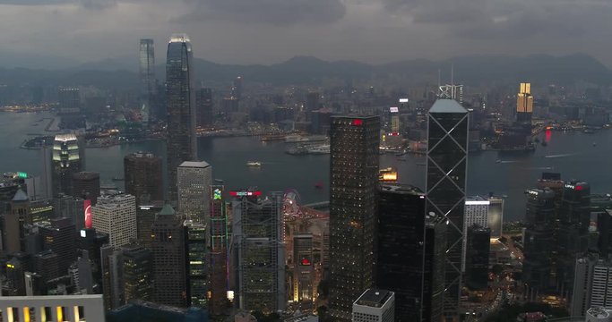 Drone aerial shot of modern skyscrapers in Hong Kong City, Asia. China. Harbour view from Hong Kong Island to Kowloon. 