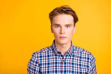 Close up photo amazing youngster he him his man looking straight on camera perfect styling ready for new beginning wear casual plaid checkered shirt outfit isolated yellow bright background