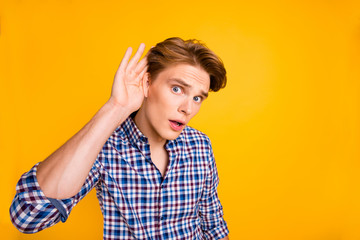 Close-up portrait of his he nice attractive worried guy wearing checked shirt trying to hear...