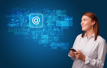 Young person using phone with mail and online communication concept
