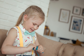 happy pretty little girl at birthday party, indoor