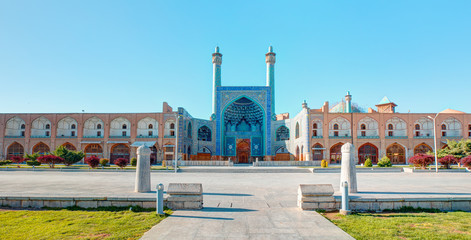 Fototapeta na wymiar Shah (Imam) Mosque (Jameh Abbasi Mosque), Imam mosque - Ali Qapu Palace on Naqsh-e Jahan Square - Isfahan, Iran