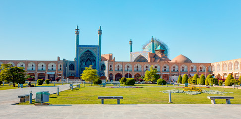 Fototapeta na wymiar Shah (Imam) Mosque (Jameh Abbasi Mosque), Imam mosque - Ali Qapu Palace on Naqsh-e Jahan Square - Isfahan, Iran