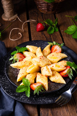 Kopytka - polish potato dumpling with strawberries
