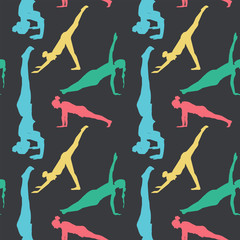 yoga silhouettes seamless pattern. vector color illustration