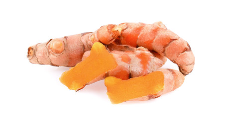 fresh turmeric on white background.