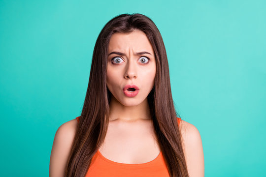 Portrait disappointed lovely girlish feminine youth impressed astonished horrible terrible gossip rumor secret irritated scandal unbelievable unexpected modern summer clothes isolated green background