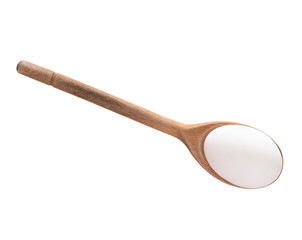 White farm fresh egg on wooden spoon isolated on white.