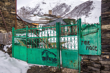 green iron gate in ushguli