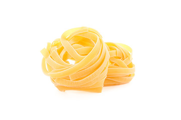 Pasta isolated on white background, closeup. Dry uncooked whole pasta