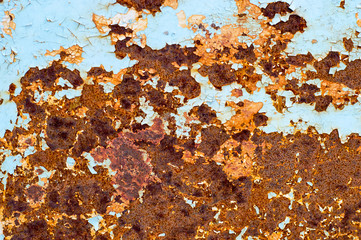 Rusty old painted metal wall texture or background