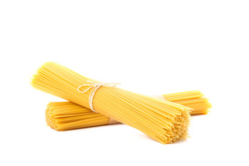 Pasta isolated on white background. Uncooked whole wheat pasta