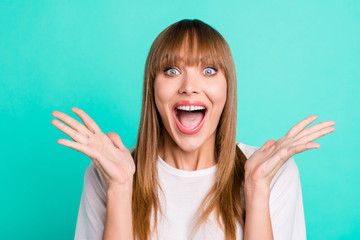 Portrait of astonished charming teen teenager impressed incredible discount rumor gossip secret cant believe fringe wave hands palms shout yell dressed modern youth clothes isolated green background