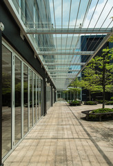 bright glass canopy street corridor perspective