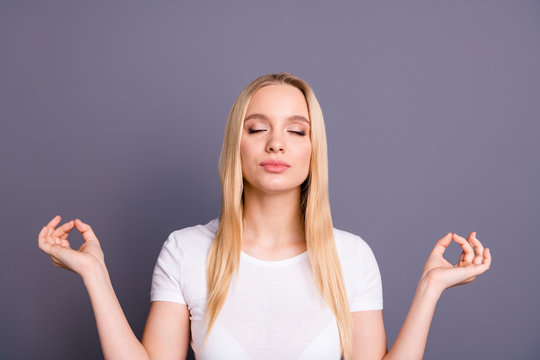 Portrait of  charming cheerful content kayd millennial make faces grimace celebrate carefree holidays careless scream shout yell rejoice dressed t-shirt youth modern isolated grey background