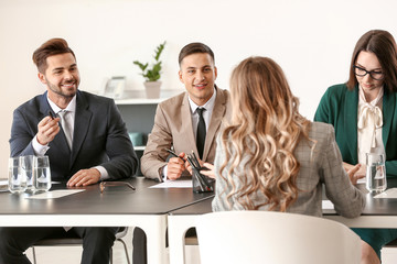 Human resources commission interviewing woman in office