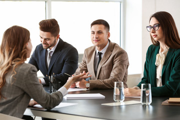 Human resources commission interviewing woman in office