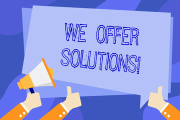 Writing note showing We Offer Solutions. Business concept for way to solve problem or deal with difficult situation Hand Holding Megaphone and Gesturing Thumbs Up Text Balloon